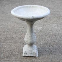 A cast stone bird bath, 78cm high