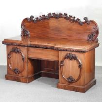 A 19th century mahogany pedestal sideboard, on inverted breakfront form, the shaped gallery back