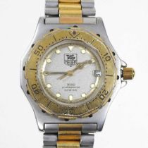A Tag Heuer 3000 ladies steel and gold plated wristwatch, the 22mm dial signed professional 200