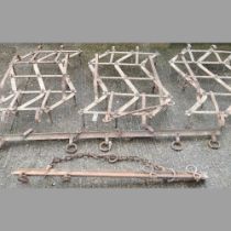 A set of vintage tractor harrow, in three sections, each 74 x 130cm