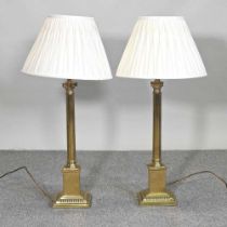 A pair of large brass table lamps and shades, 86cm high (2)