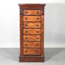 A good Victorian burr walnut Wellington chest, containing seven short drawers, enclosed by a locking