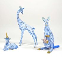 A Herend porcelain model of a giraffe, 20cm high, together with a kangaroo and a unicorn, all in