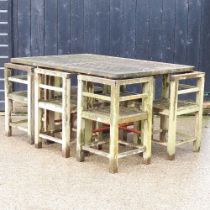 A teak garden table, together with a set of six matching chairs 147w x 99 x 77h cm Overall condition