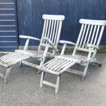 A pair of teak folding steamer chairs (2)