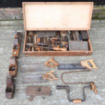 A collection of hand tools, to include woodworking planes and a carpenters tool box