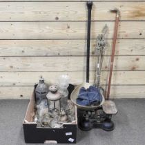 A collection of metal wares, to include lanterns, walking sticks, fire tools and a set of iron