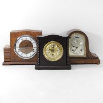 A 1920's Smiths mantel clock, with Westminster chimes, 23cm high, together with two other clocks (