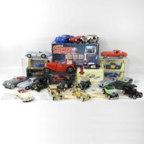 A collect of diecast model vehicles, to include a boxed matchbox stingray set