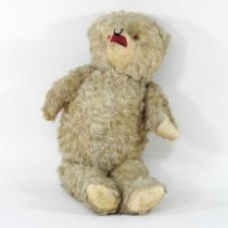 A mid 20th century plush teddy bear, 54cm high