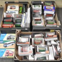 A collection of Corgi and other diecast model toy buses, mostly boxed