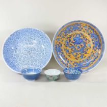 A Chinese blue and white pottery charger, 40cm diameter, together with a bowl and three smaller