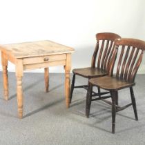 A pine side table, with a single drawer, on turned legs, together with two splat back chairs (3)