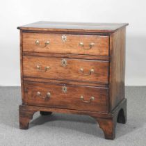 A small George III and later chest of three drawers, on bracket feet 73w x 43d x 78h cm