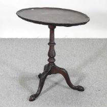 A 19th century carved mahogany tilt-top occasional table, 63cm high