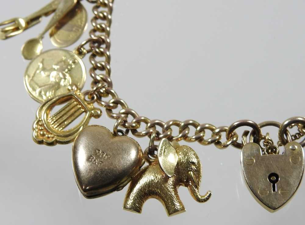 A 9 carat gold curb link charm bracelet, suspended with a collection of fourteen various novelty - Image 2 of 5