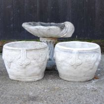 A pair of reconstituted stone garden pots, together with a bird bath, 45cm high (3)