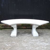 A cast stone garden bench with a curved seat 150w x 58d x 40h cm