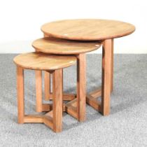 A nest of three circular contemporary oak side tables (3) 50d x 42h cm largest