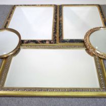Two black and floral framed wall mirrors, 105 x 74cm, together with another smaller and two gilt