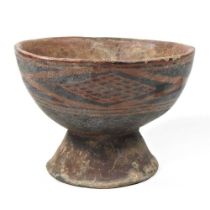 A glazed terracotta pedestal bowl, possibly pre-Columbian, 18cm diameter