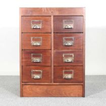 A mid 20th century hardwood filing chest, containing eight narrow drawers 57w x 61d x 84h cm