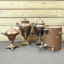 A 19th century copper samovar, together with two others and a copper kettle (3)