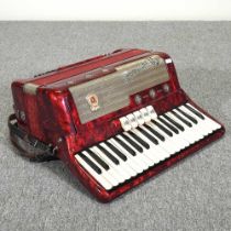 A Marinucci Recineti accordion, in a hard case