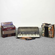 A Hohner Atlantic IV accordion, together with two others (3)