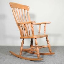 A beech splat back rocking chair