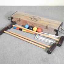 A Townsend croquet set, in a wooden box, 108cm