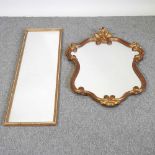 A gilt framed dressing mirror, 119 x 33cm, together with a shaped gilt framed wall mirror (2)