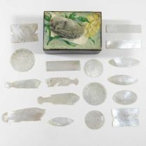 A collection of 19th century Chinese mother of pearl gaming counters, of various shapes with