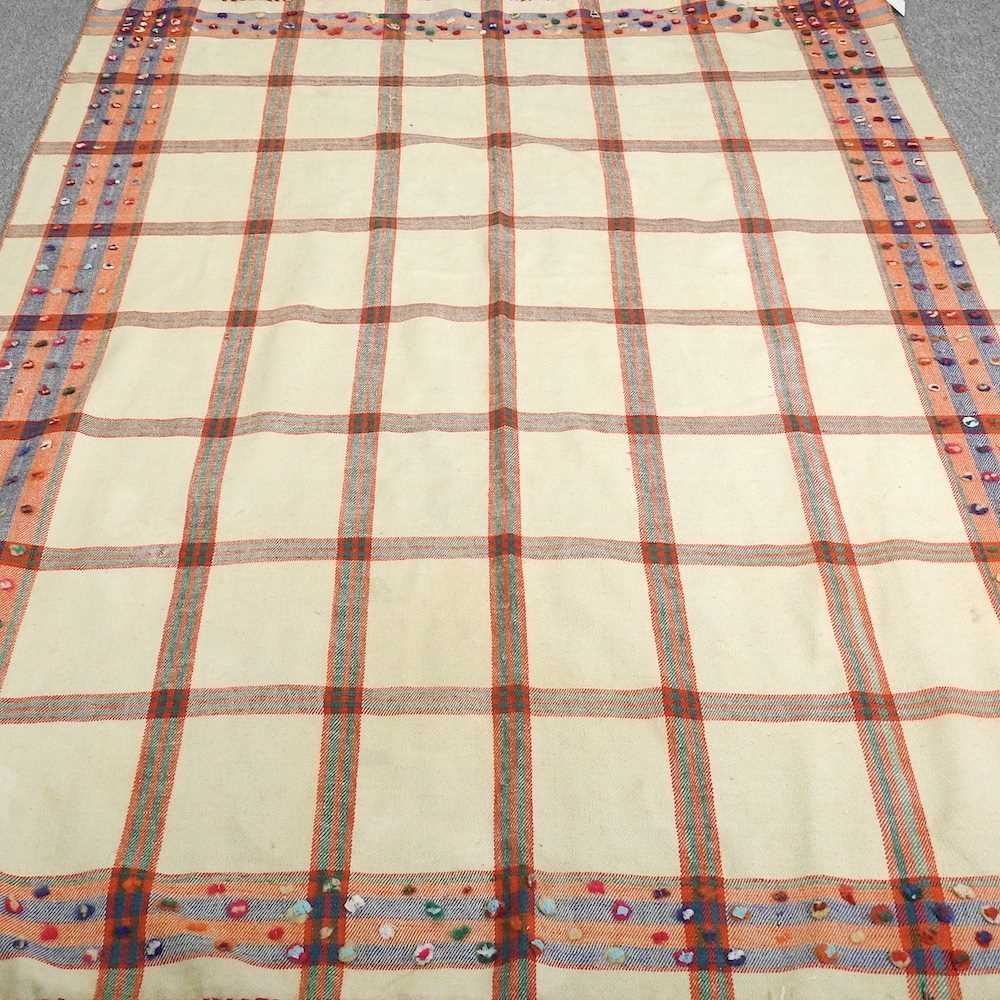 A Persian kilim, with all over squares, 225 x 165cm
