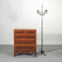 An early 20th century mahogany bachelor's chest, together with an iron standard lamp (2) 61w x 38d x