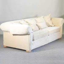 A large cream upholstered Multiyork chesterfield sofa, with loose cushions 238w x 113d x 76h cm