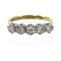 An 18 carat gold and platinum set five stone diamond ring, approx. 0.6 carats, 2.6g, size O