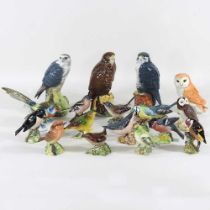 A Beswick pottery model of an owl, 12cm high, together with a collection of small Beswick birds, a