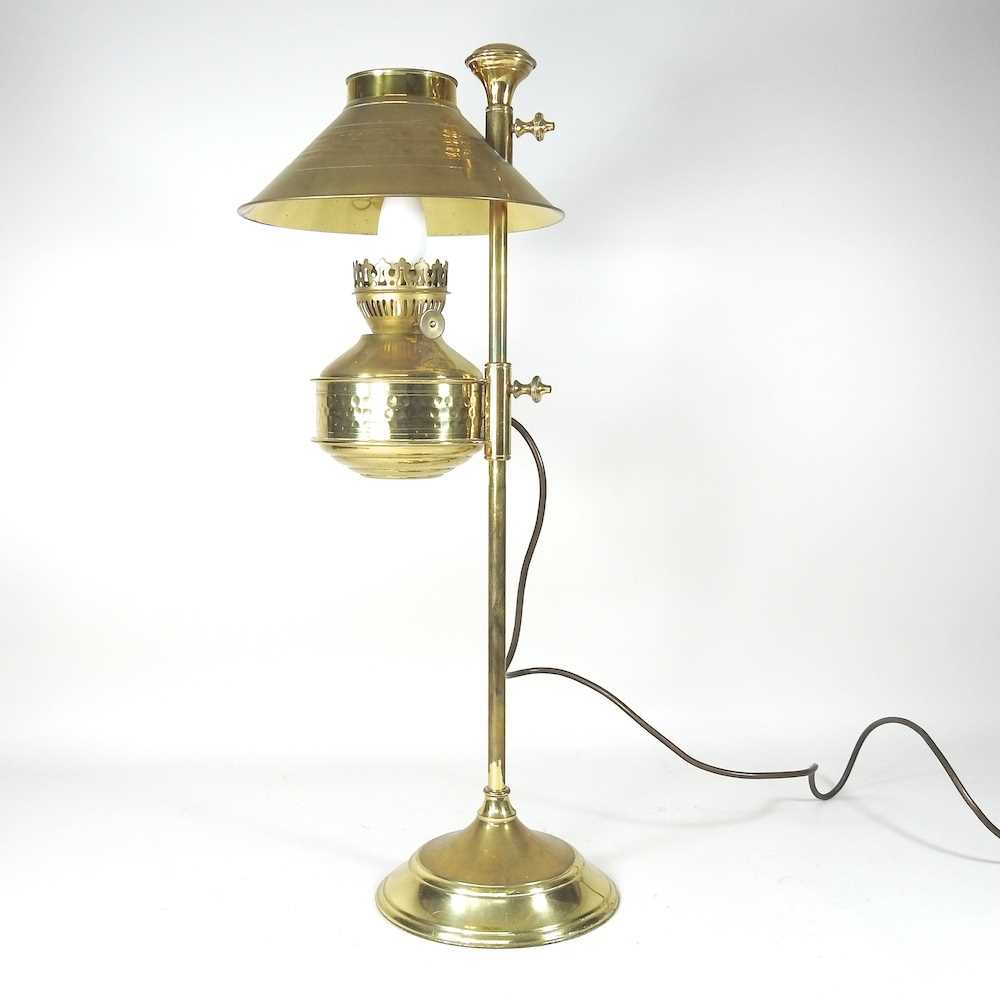 A brass table lamp, in the form of a Victorian adjustable student's lamp, 60cm high