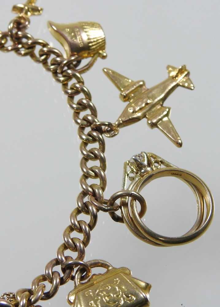 A 9 carat gold curb link charm bracelet, suspended with a collection of fourteen various novelty - Image 3 of 5