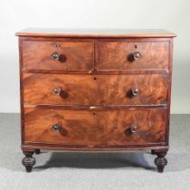 A Victorian mahogany bow front chest of drawers, on turned feet 99w x 57d x 91h cm