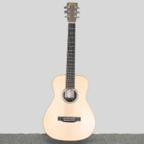 A CF Martin LX1E acoustic guitar, serial number 386272, 87cm long, in a soft case Overall