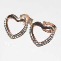 A pair of Swarovski crystal earrings, of heart shape, boxed