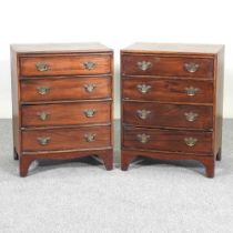 A pair of small early 20th century mahogany bachelor's chests, of Georgian style, on bracket feet (
