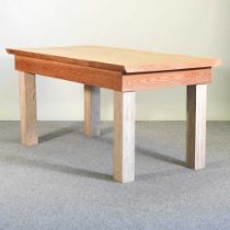 A rustic pine kitchen table, on square legs 155w x 81d x 76h cm