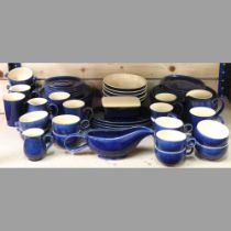 A 1970's Denby blue glazed part tea and dinner service, to include dinner plates and jugs