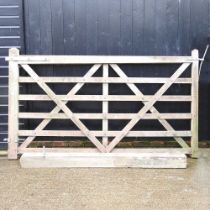 A six bar wooden farm gate, 229 x 139cm, together with a latch post (2)