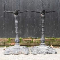 A pair of cast iron table bases, 70cm high (2)