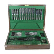 A mid 20th century Harrods stainless steel canteen of cutlery, with eight place settings, stamped