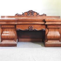 A 19th century mahogany pedestal sideboard, of inverted breakfront form, with a shaped gallery
